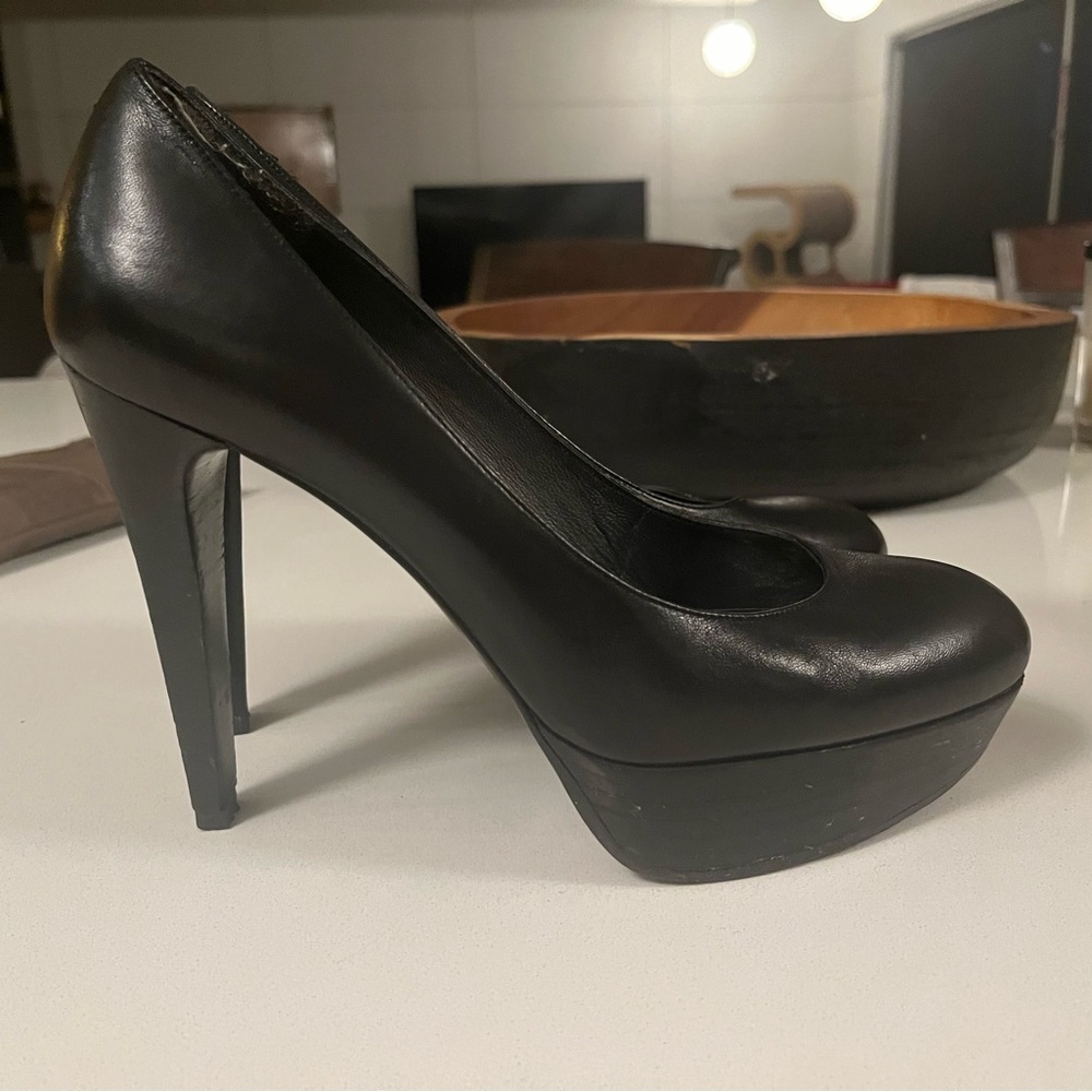 Stuart Weitzman black 5” platform pumps size 9